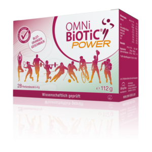 Packung OMNi BiOTiC POWER mit stilisierten Sportlern, blut-orangem Geschmack und 28 Portionsbeuteln.