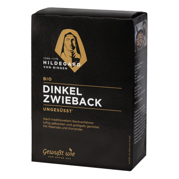 Schwarze Verpackung mit dem Aufdruck "Bio Dinkel Zwieback ungesüßt" und einem Bild von Hildegard von Bingen.