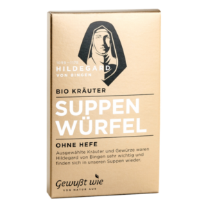 Verpackung von Bio Kräuter Suppenwürfel, goldfarben mit Illustration von Hildegard von Bingen und Textinformationen.