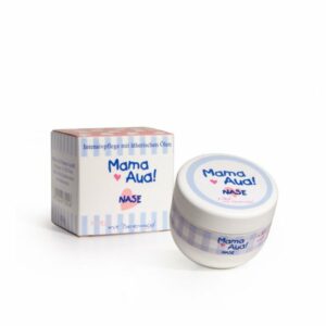 Runde Creme-Dose mit dem Aufdruck 'Mama Aua! Nase' neben einer quadratischen Verpackung mit Streifenmuster.