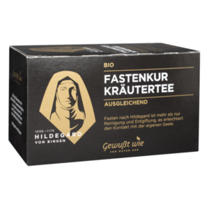 Schwarze Verpackung eines Bio-Kräutertees für eine Fastenkur mit Abbildung von Hildegard von Bingen und erklärendem Text.