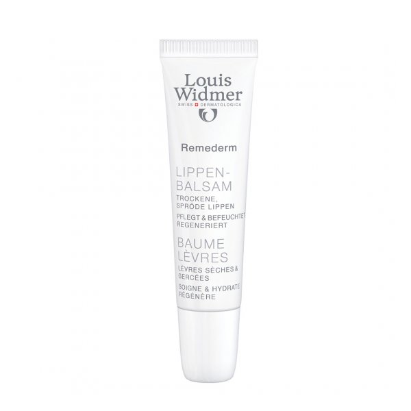 Lippenbalsam in einer weißen Tube mit Pflegehinweisen für trockene und spröde Lippen.