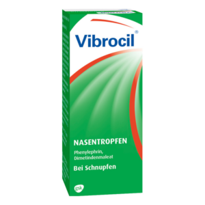 Grüne Verpackung mit weißer und blauer Schrift für Vibrocil Nasentropfen, geeignet bei Schnupfen.
