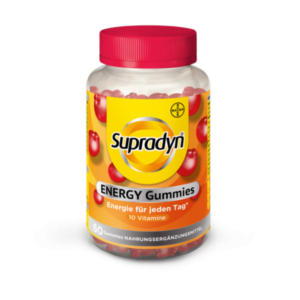 Transparente Flasche mit rotem Deckel, gefüllt mit roten Gummies, die Vitamine enthalten und Energie versprechen.