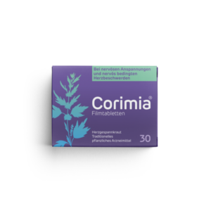Packung mit Corimia Filmtabletten, lila Hintergrund, mit Pflanzenmotiv, für nervöse Herzbeschwerden.
