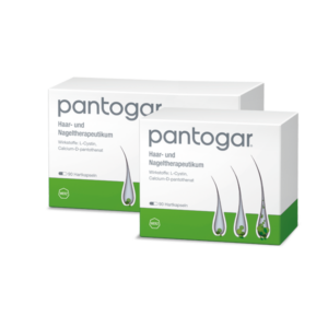 Zwei Verpackungen des Haar- und Nageltherapeutikums Pantogar mit Informationen über Inhaltsstoffe und Anwendung.