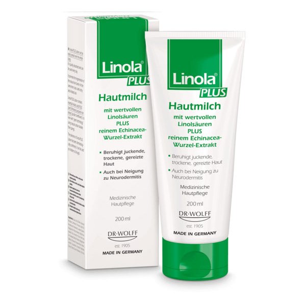 Hautmilch in einer Kunststofftube mit grünem Verschluss, verpackt in einer passenden Kartonbox, wird als medizinische Hautpflege angezeigt.