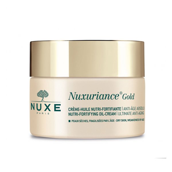 Nuxe Nuxuriance Gold Creme-Öl in einem runden, hellen Tiegel mit goldfarbenem Deckel und grüner Schrift.