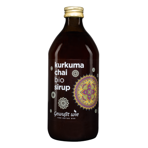Braune Glasflasche mit gelbem Schraubverschluss, gefüllt mit Bio-Kurkuma-Chai-Sirup, dekoriert mit bunten Mandala-Mustern.