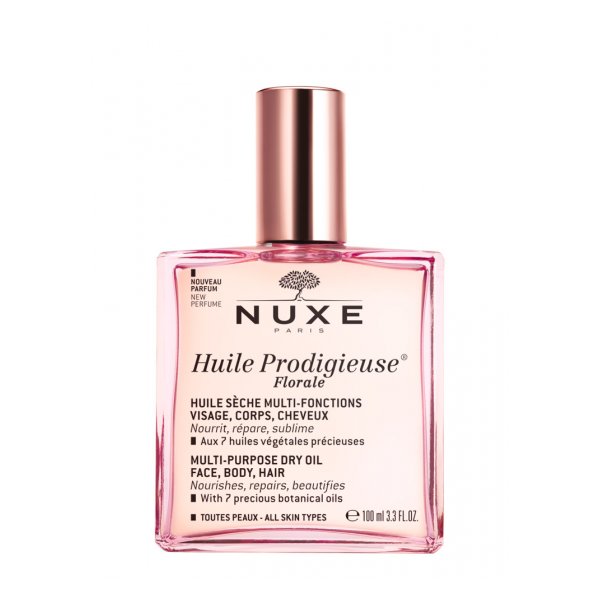 Flasche mit trockener Multifunktionsöl von Nuxe in transparentem Design mit rosa Kapselfarbe.