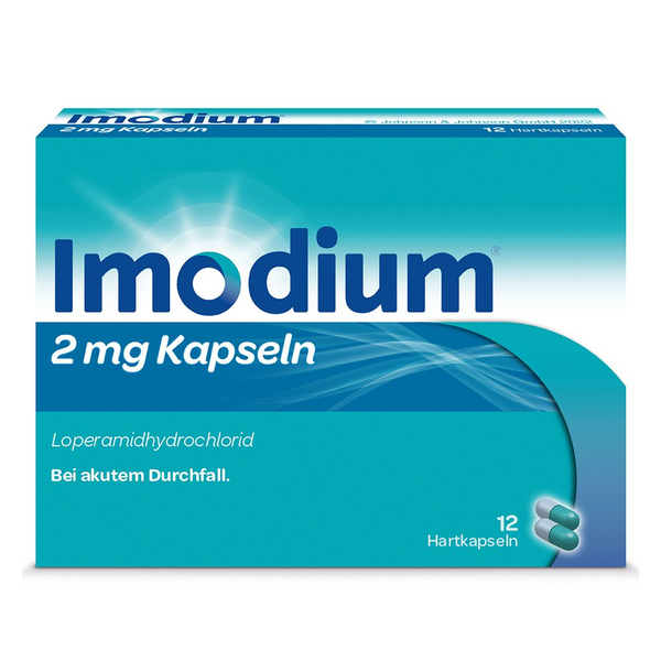 Verpackung von Imodium Kapseln, 2 mg, zur Behandlung von akutem Durchfall, mit blauer und grüner Gestaltung.