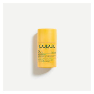 Gelber Sonnenschutzstick mit SPF 50 von Caudalie, geeignet für Gesicht und empfindliche Bereiche.