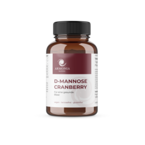 Braune Glasflasche mit schwarzem Deckel, gefüllt mit D-Mannose Cranberry für gesunde Blase, vegan und glutenfrei.