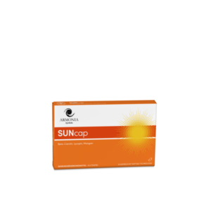 Verpackung des Nahrungsergänzungsmittels SUNcap von Armonia mit sonnigem Design und Inhaltsstoffen in orangefarbener Box.