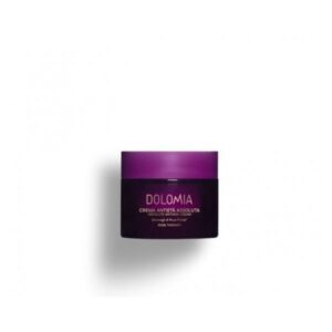 Dunkelviolette Anti-Aging-Creme im Glasbehälter mit goldfarbener Schrift.