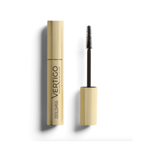 Eine goldfarbene Mascara-Verpackung von Dolomia mit einem schwarzen Applikatorbürstchen daneben.