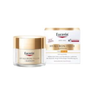 Eucerin Hyaluron-Filler + Elasticity Tagescreme in glasartigem Behälter mit goldfarbenem Deckel, umgeben von der Verpackung.