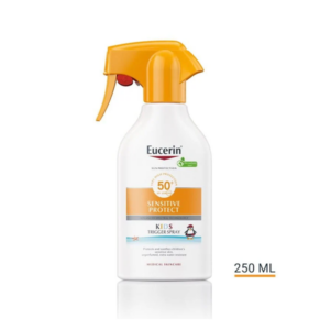 Sonnenschutzspray für Kinder in einer weißen Sprühflasche mit orangenem Sprühkopf, LSF 50, 250 ml.