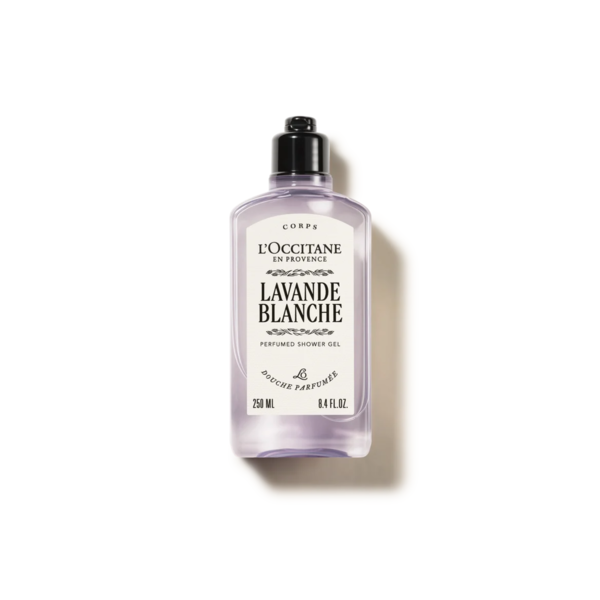 Flasche mit lila Duschgel von L'Occitane, Lavande Blanche, 250 ml, mit schwarzem Deckel und dekorativem Etikett.