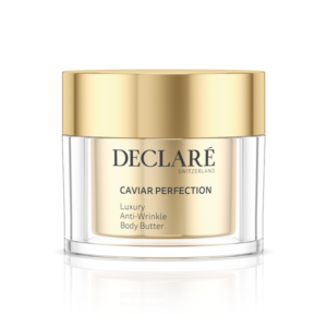 Eine Glascreme-Dose mit goldener Schraubverschlusskappe, beschriftet mit "Caviar Perfection" von DECLARE.