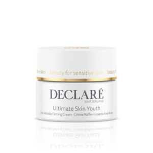 Weißer Tiegel mit goldener Kappe, beschriftet mit "Ultimate Skin Youth" und "Anti-Wrinkle Firmer".