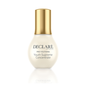 Flasche mit einem weißen Serum und goldenen Verschluss, beschriftet mit "DECLARÉ PRO YOUTHING Youth Supreme Concentrate".