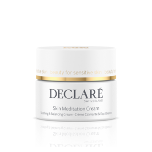 Eine weiße Cremepackung mit goldenen Akzenten, bezeichnet als Skin Meditation Cream von DECLARÉ für empfindliche Haut.