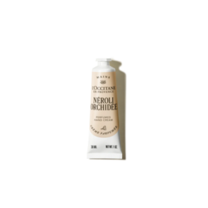 Handcreme von L'Occitane mit Neroli- und Orchideen-Duft in einer metallischen Tube.