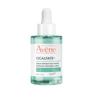Transparente Flasche mit Pipette, gefüllt mit einem intensiven Reparaturserum von Avène, 30 ml.