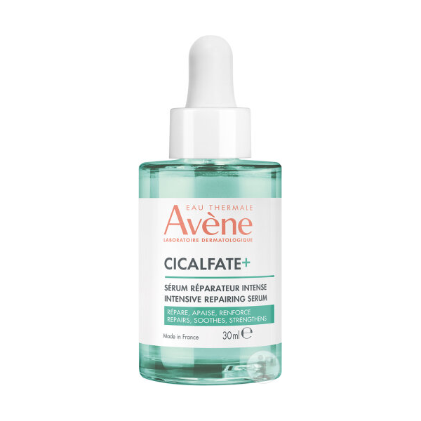 Transparente Flasche mit Pipette, gefüllt mit einem intensiven Reparaturserum von Avène, 30 ml.