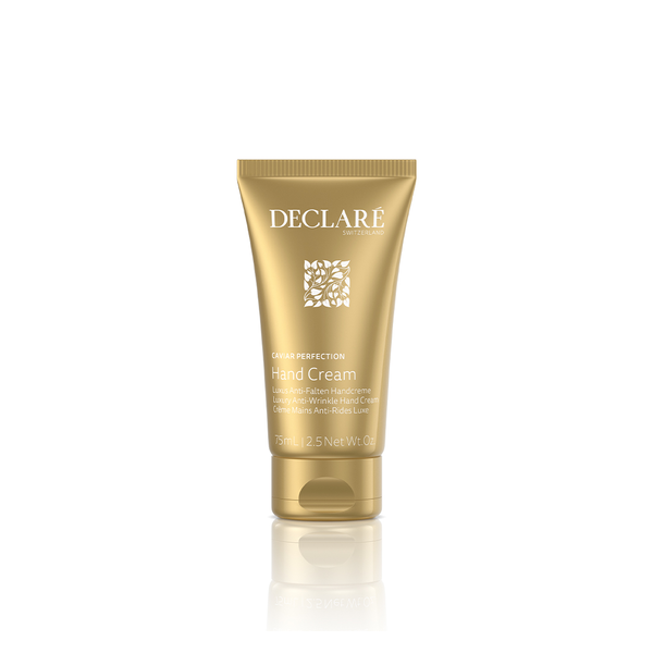 Goldfarbene Tube der Declare Caviar Perfection Handcreme mit Schutzverschluss und edlem Design.