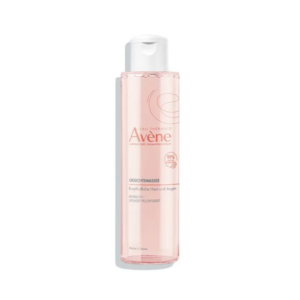 Transparentes Behältnis mit Gesichts-Gel von Avène, geeignet für empfindliche Haut, rosafarbene Flüssigkeit.